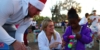 Jj Watt And Kealia Ohai Giving Gift To A Resident Child