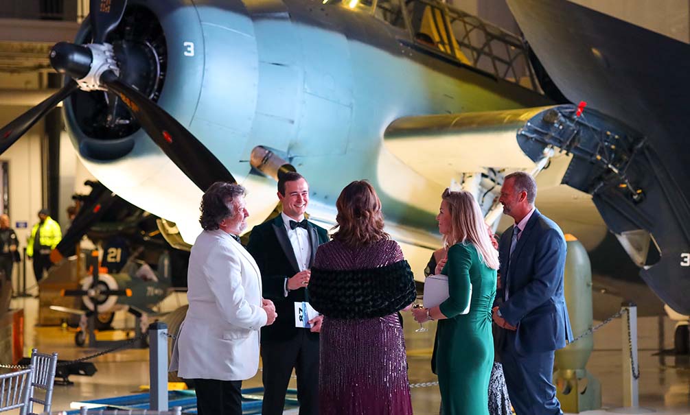 Guests Enjoying The Evening In The Hangar Photo By Katy Anderson