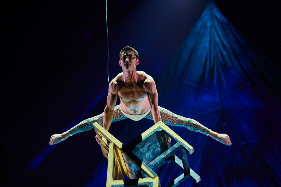 Gymnast on Chairs at Cirque du Soleils KOOZA (Photo by Matt Beard and Bernard Letendre)