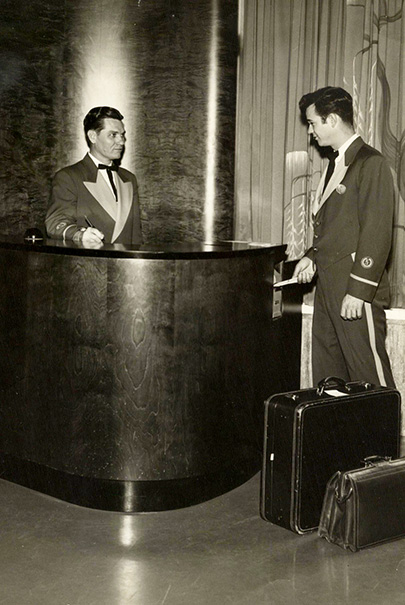 Shamrock Hotel Registration Desk With Bellhop Johnny Sicola 1955