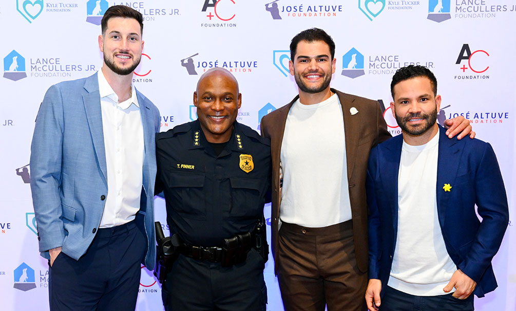 Kyle Tucker, Police Chief Troy Finner, Lance McCullers, Jr. and Jose Altuve (Photo by CatchLight Group)