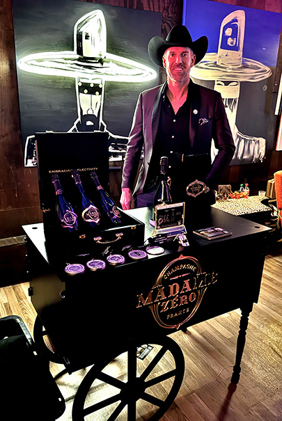 Matthew Massey With Champagne Madame Zero